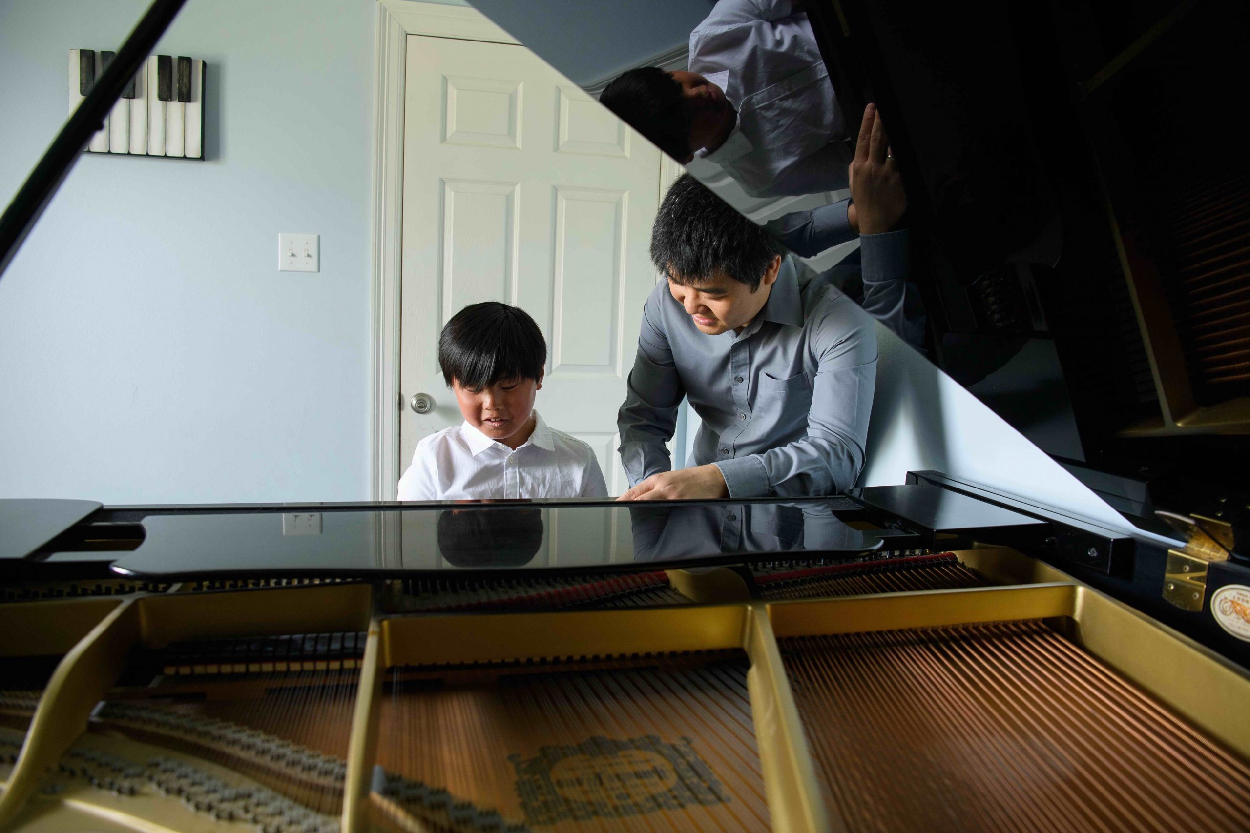 Teacher and young student | Yee Music Studio