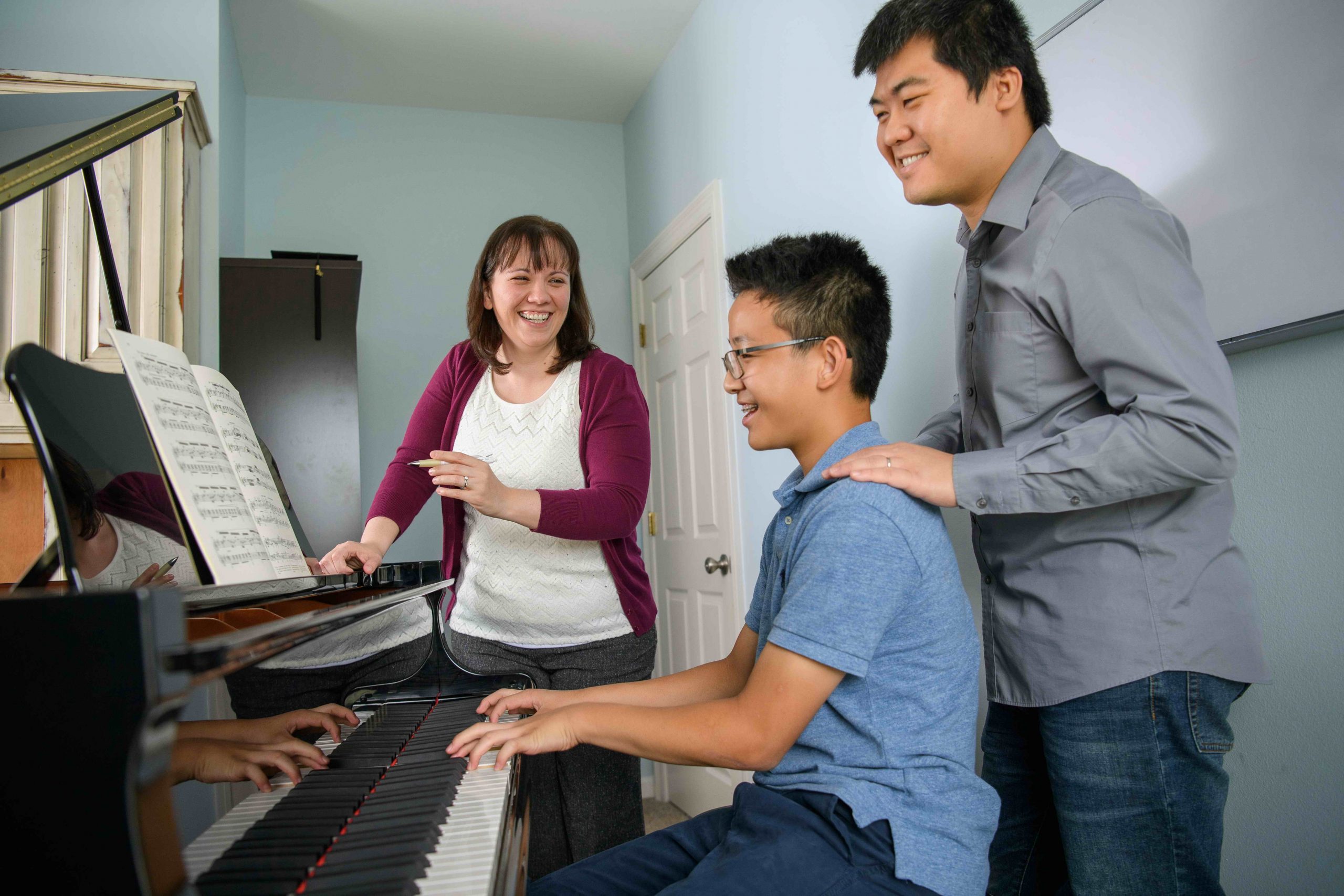 Team teaching piano lesson